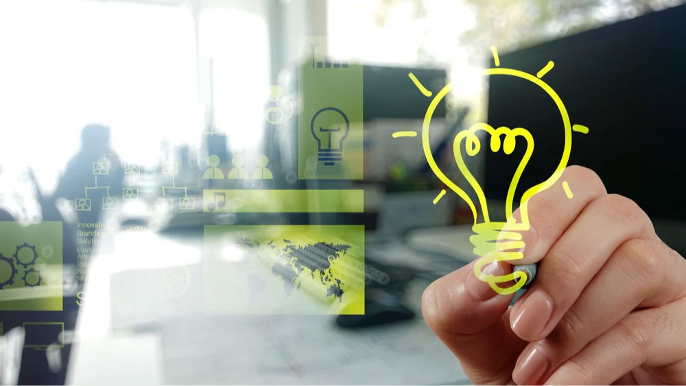 hand drawing creative business strategy with light bulb as concept